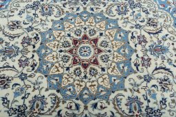 Central medallion detail of 1970s Nain rug from Iran / Persia