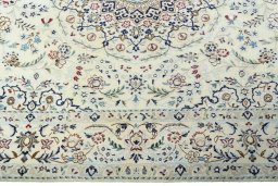 Corner detail of New Nain rug showing border pattern and Wool pile