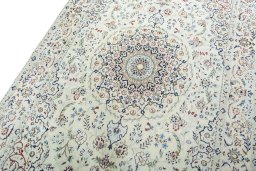 Backside of handmade New Nain rug showing knot structure and weave density