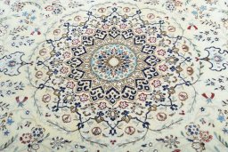Central medallion detail of New Nain rug from Iran / Persia