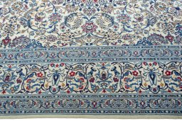 Corner detail of New Nain rug showing border pattern and Wool pile
