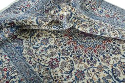 Surface texture of New Nain rug with natural Wool and intricate pattern