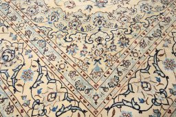 Corner detail of 1990s Nain rug showing border pattern and Wool pile