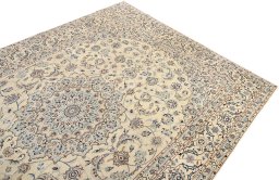 Surface texture of 1990s Nain rug with natural Wool and intricate pattern