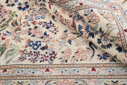 Backside of handmade 1980s Nain rug showing knot structure and weave density