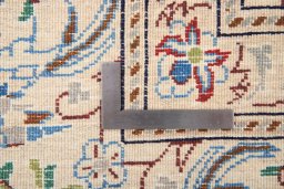 Central medallion detail of 1980s Nain rug from Iran / Persia