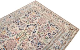 Surface texture of 1980s Nain rug with natural Wool and intricate pattern