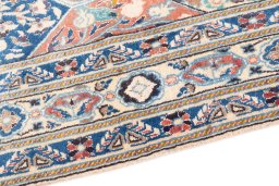 Backside of handmade 2004s Nain rug showing knot structure and weave density