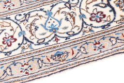 Backside of handmade 1985s Nain rug showing knot structure and weave density