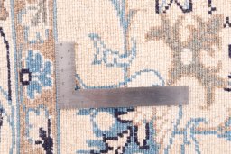Corner detail of 2005s Nain rug showing border pattern and Wool pile