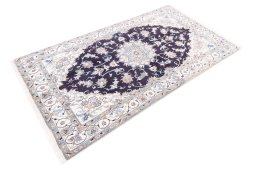 Corner detail of 2005s Nain rug showing border pattern and Wool pile