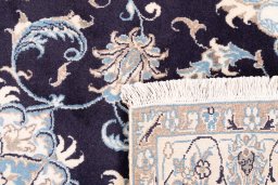 Close-up detail of 2005s Nain rug from Iran / Persia showing Wool weave