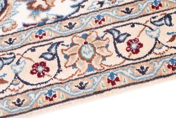 Backside of handmade 2005s Nain rug showing knot structure and weave density