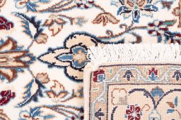 Close-up detail of 2005s Nain rug from Iran / Persia showing Wool weave