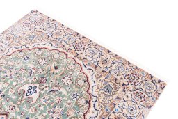 Surface texture of 1999s Nain rug with natural Wool and intricate pattern