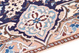 Backside of handmade 1988s Nain rug showing knot structure and weave density
