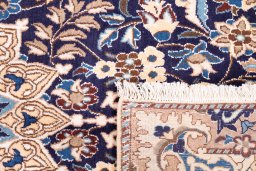 Close-up detail of 1988s Nain rug from Iran / Persia showing Wool weave
