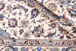 Corner detail of 1988s Nain rug showing border pattern and Wool pile