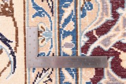 Close-up detail of 1987s Nain rug from Iran / Persia showing Wool weave