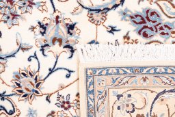 Close-up detail of 1987s Nain rug from Iran / Persia showing Wool weave