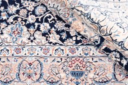 Close-up detail of 2005s Nain rug from Iran / Persia showing Wool weave