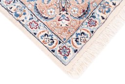 Central medallion detail of 2005s Nain rug from Iran / Persia