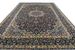 Surface texture of 2000s Najafabad rug with natural Wool and intricate pattern