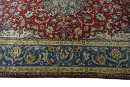Corner detail of 2000s Najafabad rug showing border pattern and Wool pile