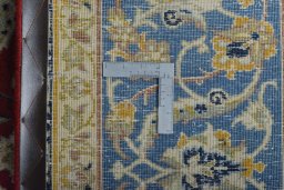Backside of handmade 2000s Najafabad rug showing knot structure and weave density