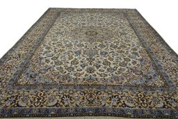 Surface texture of 2000s Najafabad rug with natural Wool and intricate pattern