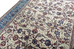 Backside of handmade 2000s Najafabad rug showing knot structure and weave density