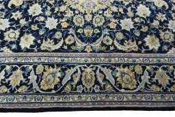 Corner detail of 2000s Najafabad rug showing border pattern and Wool pile