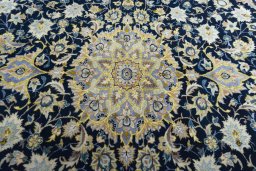 Central medallion detail of 2000s Najafabad rug from Iran / Persia