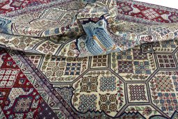 Surface texture of 2000s Najafabad rug with natural Wool and intricate pattern