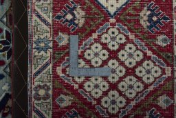 Backside of handmade 2000s Najafabad rug showing knot structure and weave density