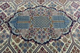 Central medallion detail of 2000s Najafabad rug from Iran / Persia