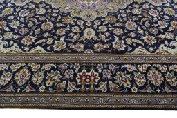 Corner detail of 2000s Najafabad rug showing border pattern and Wool pile