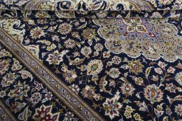 Close-up detail of 2000s Najafabad rug from Iran / Persia showing Wool weave