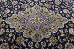 Central medallion detail of 2000s Najafabad rug from Iran / Persia