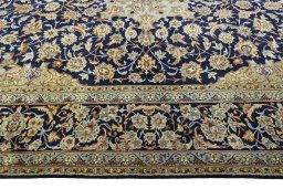 Corner detail of 2000s Najafabad rug showing border pattern and Wool pile