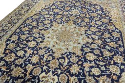 Backside of handmade 2000s Najafabad rug showing knot structure and weave density