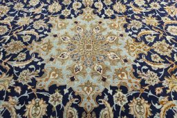 Central medallion detail of 2000s Najafabad rug from Iran / Persia