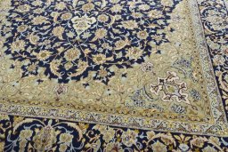 Close-up detail of 2000s Najafabad rug from Iran / Persia showing Wool weave