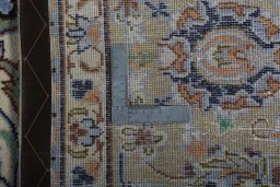 Backside of handmade 2000s Najafabad rug showing knot structure and weave density