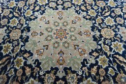 Central medallion detail of 2000s Najafabad rug from Iran / Persia