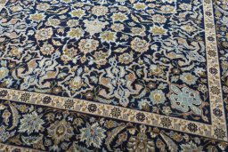 Close-up detail of 2000s Najafabad rug from Iran / Persia showing Wool weave