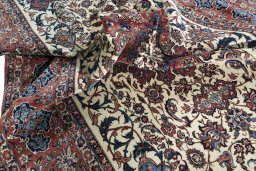 Surface texture of 1930s Najafabad rug with natural Wool and intricate pattern