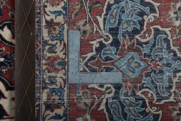 Backside of handmade 1930s Najafabad rug showing knot structure and weave density