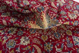 Surface texture of 2000s Najafabad rug with natural Wool and intricate pattern