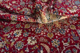 Surface texture of 2000s Najafabad rug with natural Wool and intricate pattern